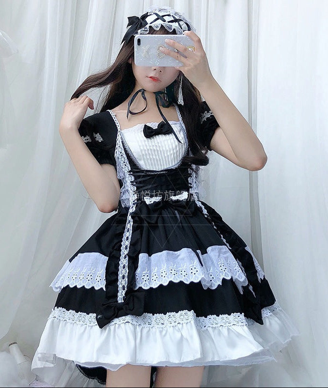 Damen verspieltes Lolita Kleid mit aufwendigen Spitzen- und Rüschendetails Echo Archiv