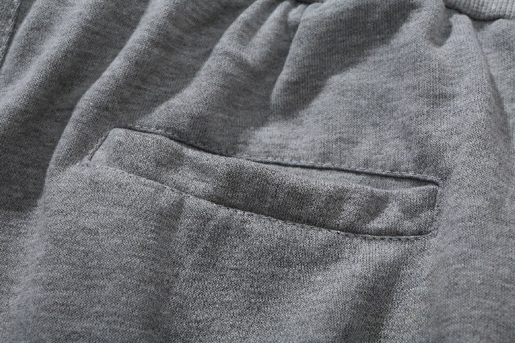 Herren Jogginghose mit seitlichen Reißverschlusstaschen und elastischem Bund Echoarchiv