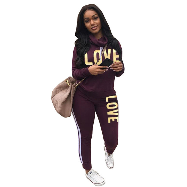 Damen nan sportives Kapuzen-Sweatshirt-Set mit Goldprint und Highwaist-Jogginghose Echo Archiv
