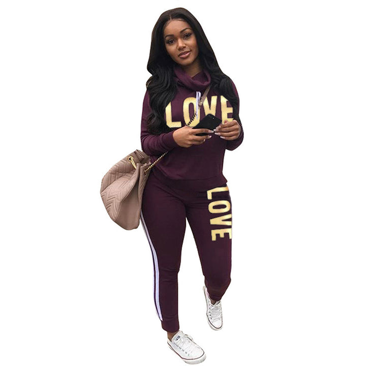 Damen nan sportives Kapuzen-Sweatshirt-Set mit Goldprint und Highwaist-Jogginghose Echo Archiv