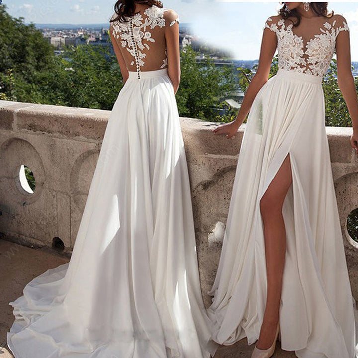 Damen Hochzeitskleid mit elegantem Spitzen-Oberteil und fließendem Rock Echoarchiv