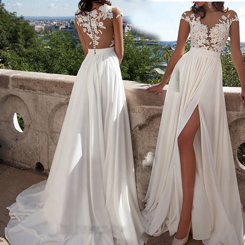 Damen Hochzeitskleid mit elegantem Spitzen-Oberteil und fließendem Rock Echoarchiv