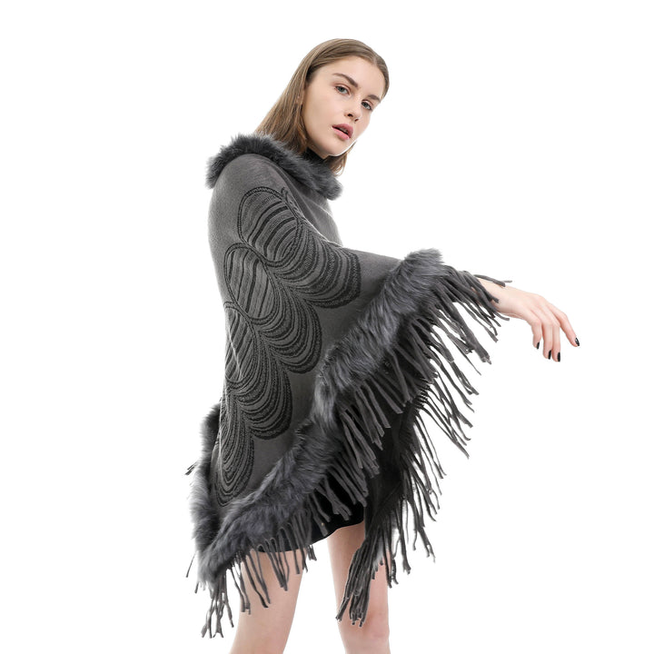 Damen Fransen‑Poncho mit Kunstfellbesatz und Jacquard‑Ruana Echo Archiv