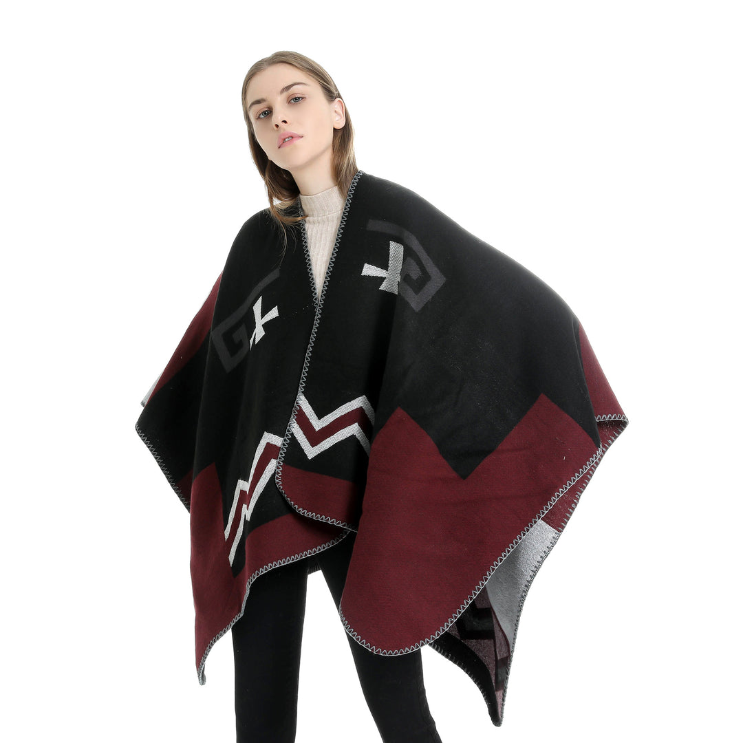 Damen Geometrischer Jacquard‑Ruana‑Überwurf mit V‑Ausschnitt und Zierstichkante – Célinea