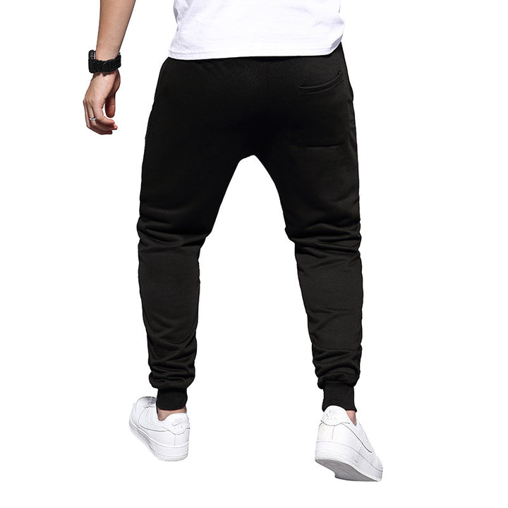 Herren Jogginghose mit tiefem Schritt, Distressed-Knieeinsatz und schmal zulaufendem Bein Echo Archiv
