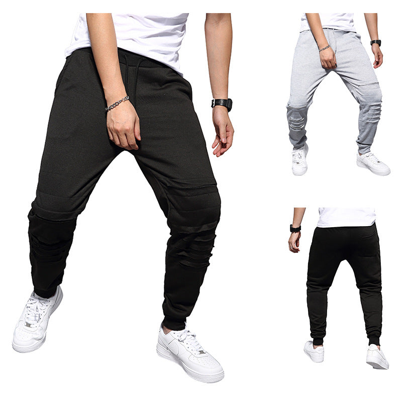 Herren Jogginghose mit tiefem Schritt, Distressed-Knieeinsatz und schmal zulaufendem Bein Echo Archiv