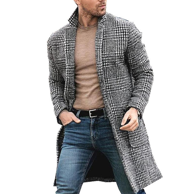 Herren eleganter Langblazer mit klassischem Karomuster und modernen Details Echoarchiv