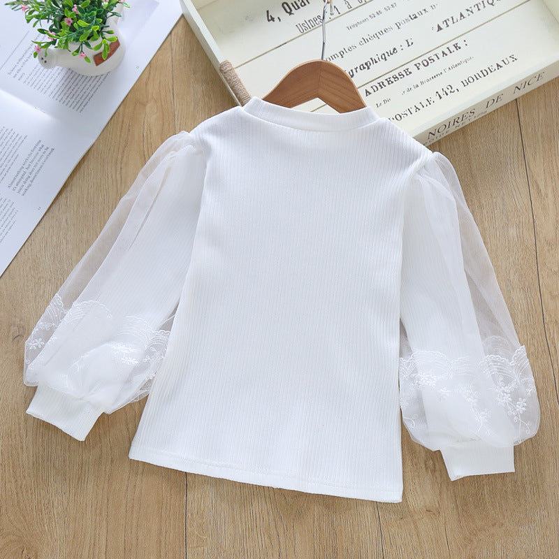 Damen Bluse mit transparenten Tüllärmeln und feinen Stickereien Echo Archiv