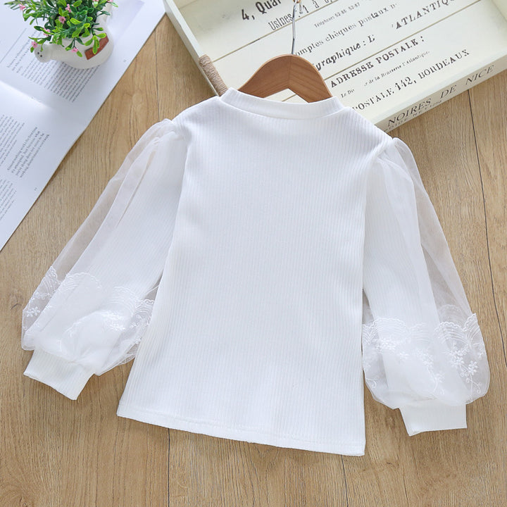 Damen Bluse mit transparenten Tüllärmeln und feinen Stickereien Echo Archiv