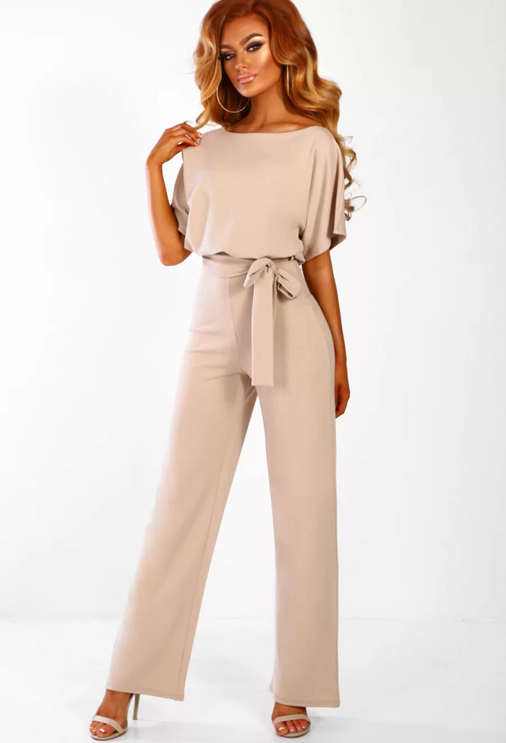 Damen elegantes Set bestehend aus fließender Bluse und weit geschnittenen Hosen Echoarchiv