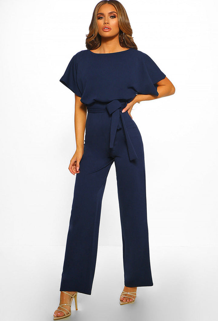 Damen elegantes Set bestehend aus fließender Bluse und weit geschnittenen Hosen Echoarchiv