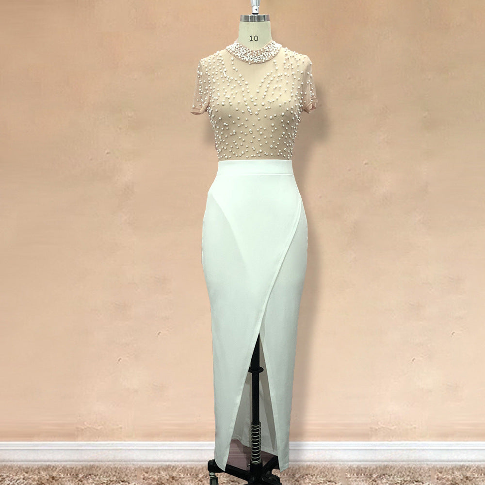 Damen Elegantes Kleid mit transparenten Puffärmeln und Perlenakzenten Echo Archiv