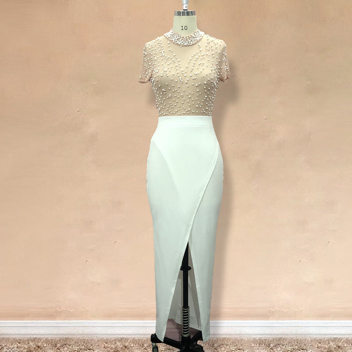 Damen Elegantes Kleid mit transparenten Puffärmeln und Perlenakzenten Echo Archiv