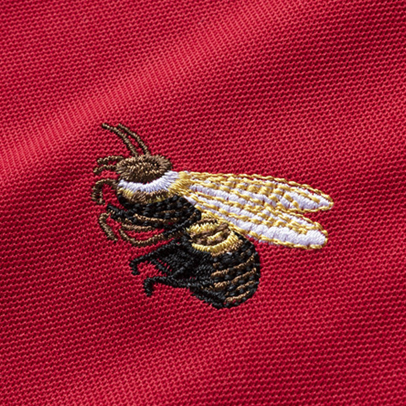 Herren Poloshirt mit gesticktem Motiv und pflegeleichtem Gewebe Echoarchiv
