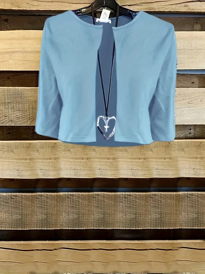 Echoarchiv – elegantes zweiteiliges blumenkleid-set mit einfarbigem crop-top und kleid mit rundhalsausschnitt