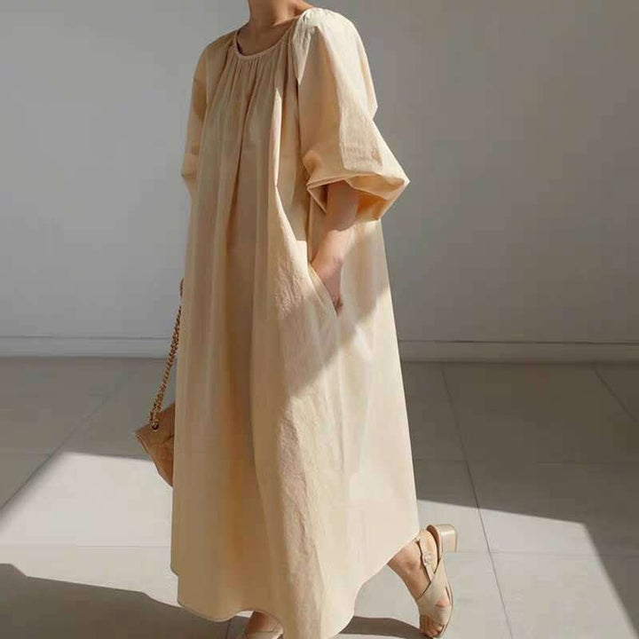 Damen Lockeres Smock-Maxikleid mit gerafftem Rundhalsausschnitt, Ballonärmeln und Eingrifftaschen – Valéora
