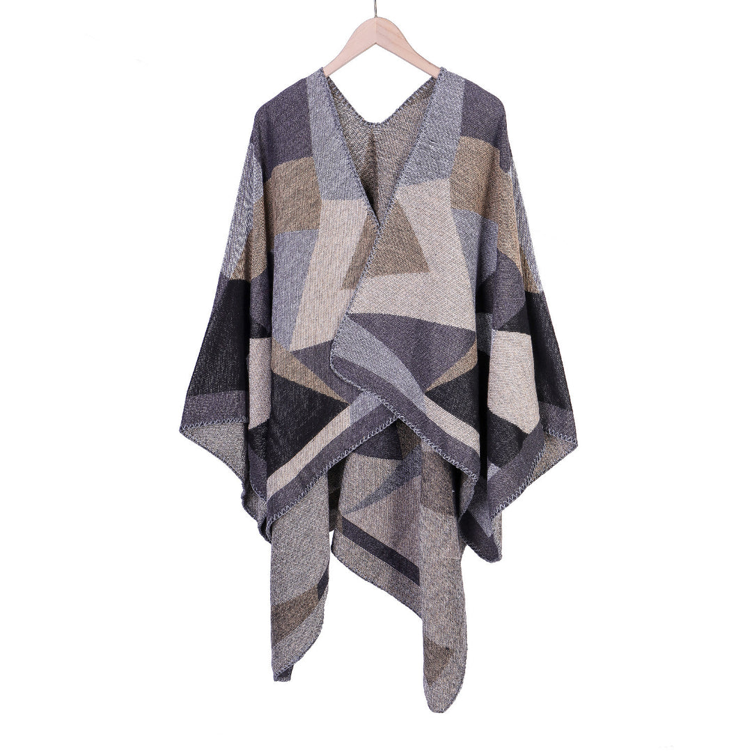 Damen Grobgestrickte Oversize-Ruana mit grafischem Blockmuster und asymmetrischem Zipfelrand Echo Archiv