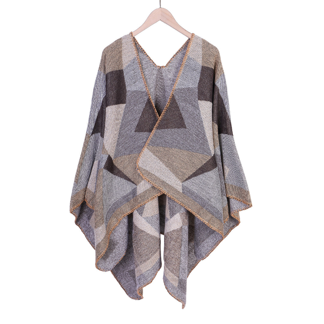 Damen Grobgestrickte Oversize-Ruana mit grafischem Blockmuster und asymmetrischem Zipfelrand Echo Archiv