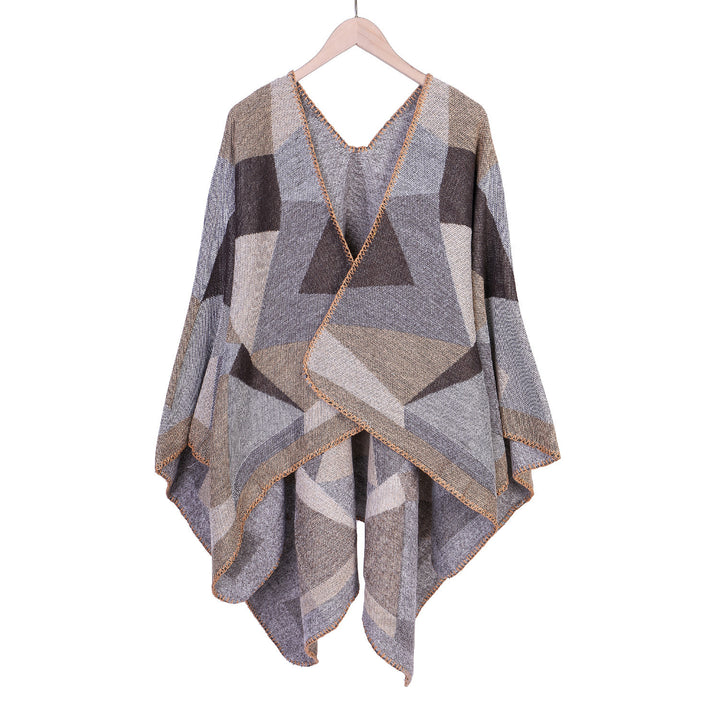 Damen Grobgestrickte Oversize-Ruana mit grafischem Blockmuster und asymmetrischem Zipfelrand Echo Archiv