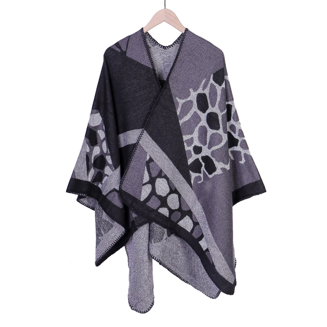 Damen Ruana-Überwurf mit geometrisch-animalischem Jacquard und Ziernaht – Célinea