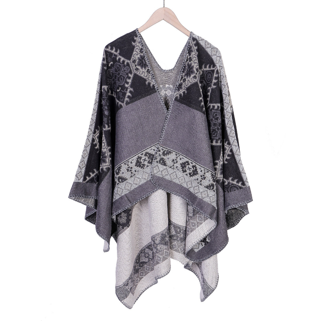 Damen Oversize-Ruana-Poncho aus Jacquardgewebe mit asymmetrischem Zipfelrand und ornamentaler Bordüre – Célinea