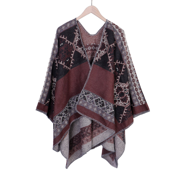 Damen Oversize-Ruana-Poncho aus Jacquardgewebe mit asymmetrischem Zipfelrand und ornamentaler Bordüre – Célinea