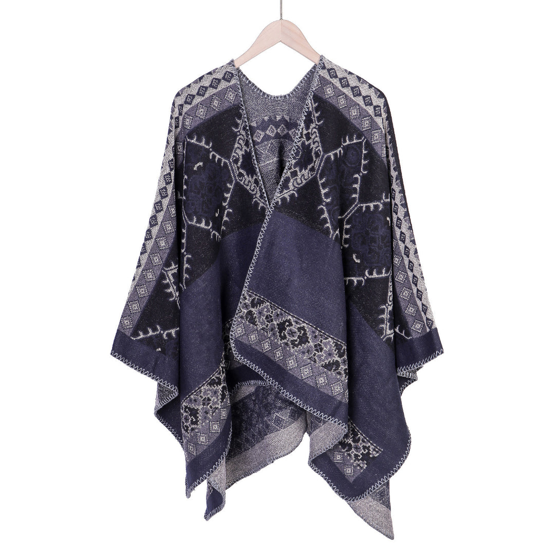 Damen Oversize-Ruana-Poncho aus Jacquardgewebe mit asymmetrischem Zipfelrand und ornamentaler Bordüre – Célinea