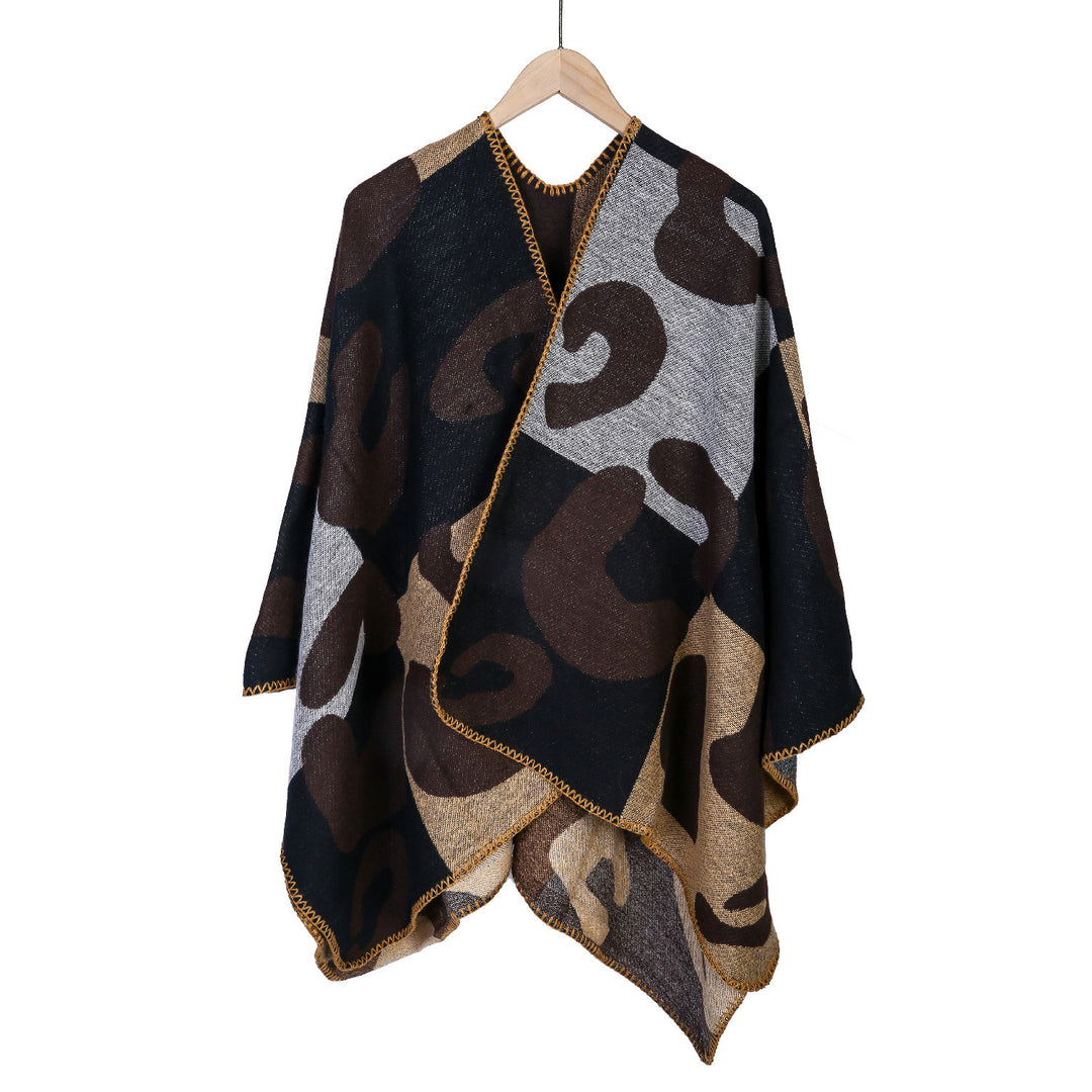Damen Oversize-Ruana mit abstraktem Grafikjacquard und dekorativer Kettelnaht – Avérine