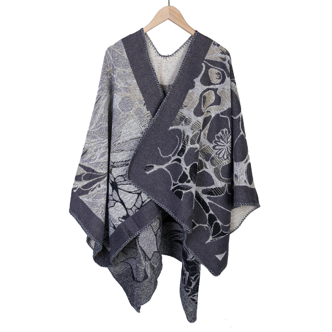 Damen Jacquard-Ruana-Poncho mit kontrastiertem Schalkragen und asymmetrischem Zipfelrand – Célinea