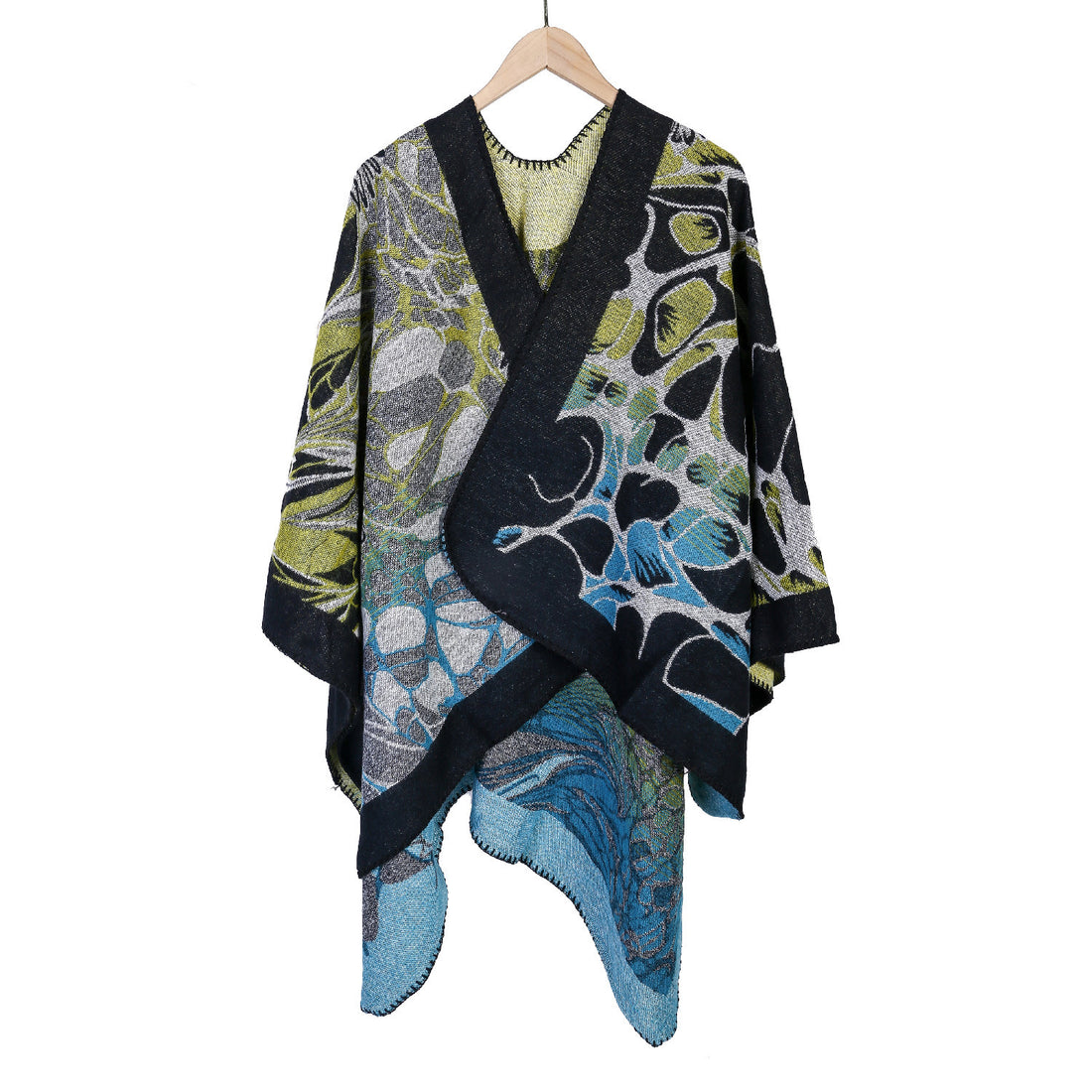 Damen Jacquard-Ruana-Poncho mit kontrastiertem Schalkragen und asymmetrischem Zipfelrand – Célinea
