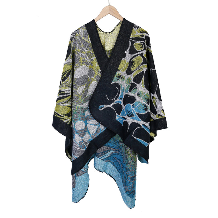 Damen Jacquard-Ruana-Poncho mit kontrastiertem Schalkragen und asymmetrischem Zipfelrand – Célinea
