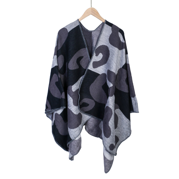 Damen Oversize-Ruana mit abstraktem Grafikjacquard und dekorativer Kettelnaht – Avérine