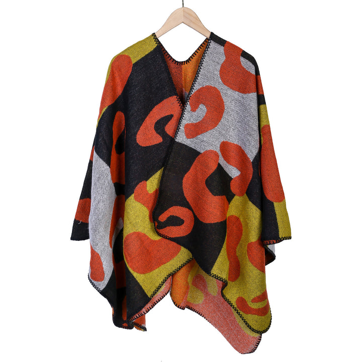Damen Oversize-Ruana mit abstraktem Grafikjacquard und dekorativer Kettelnaht – Avérine