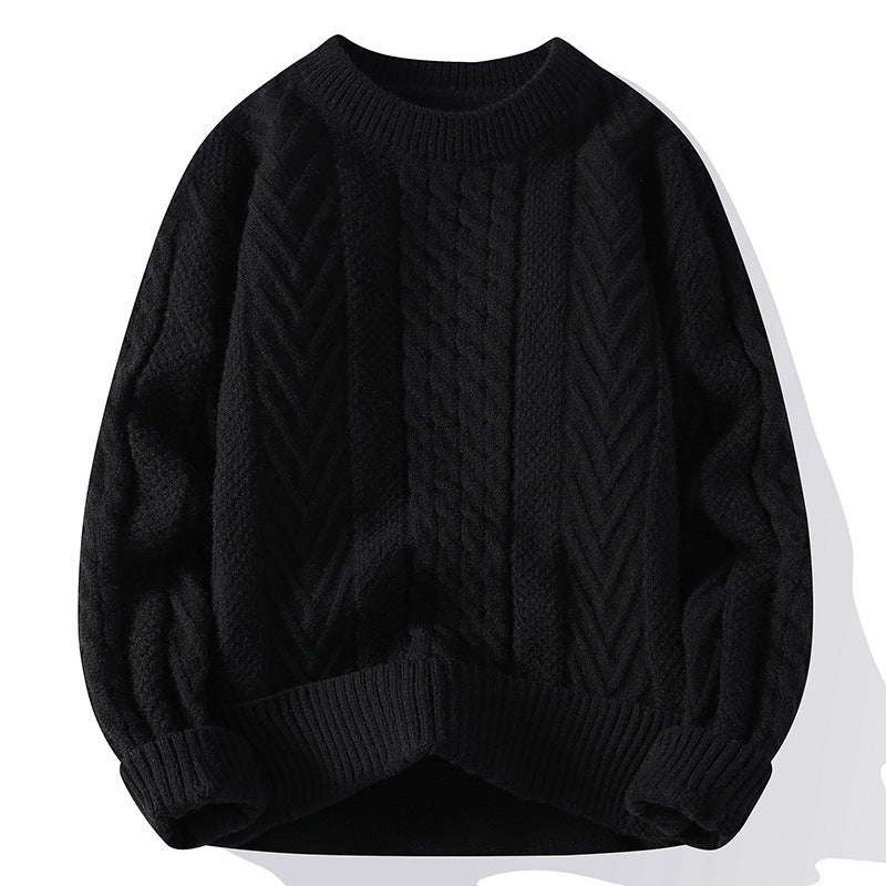 Grober Strickpullover mit Zopfmuster