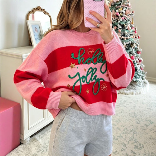 Weihnachtlicher Strickpullover mit Buchstaben-Motiv