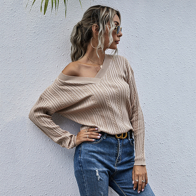 Damen Feiner Rippenstrick-Pullover mit Zopfmuster und V‑Ausschnitt Echoarchiv