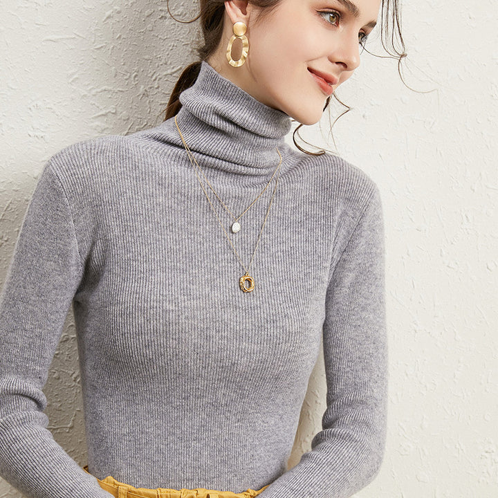 Damen Figurnaher Rippstrick-Rollkragenpullover mit kurzem Saum und weichem Fall Echoarchiv