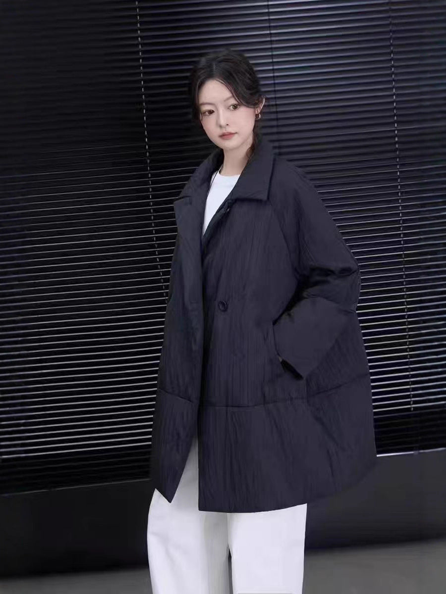 Mittellange Daunenjacke mit Revers, Weißentendaunen