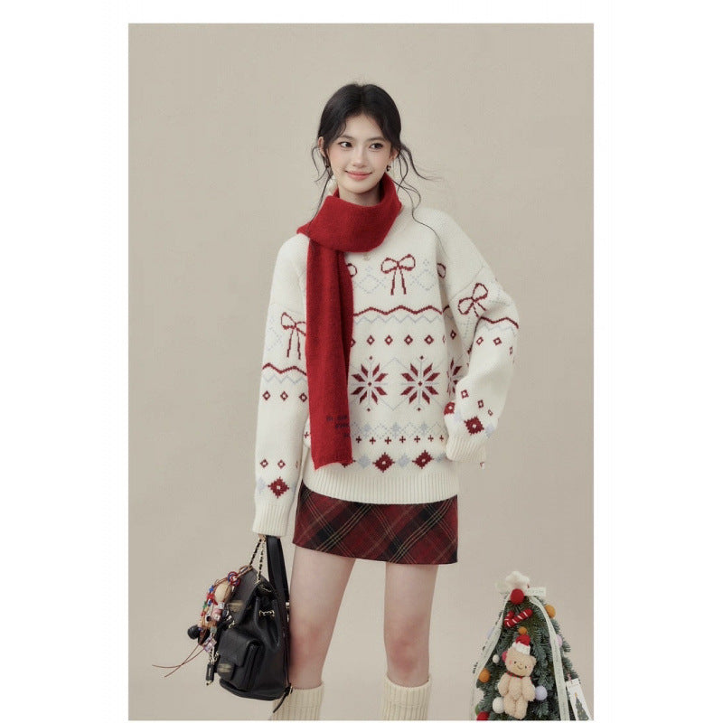 Fair-Isle-Weihnachtspullover mit Schneeflocken und Schleifen