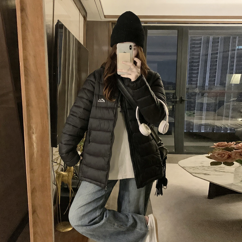Leichte, gesteppte Kapuzenjacke für Damen