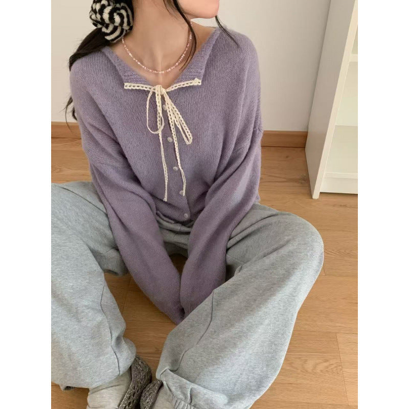 Damen-Strickjacke mit Spitzenkragen und Bindeband