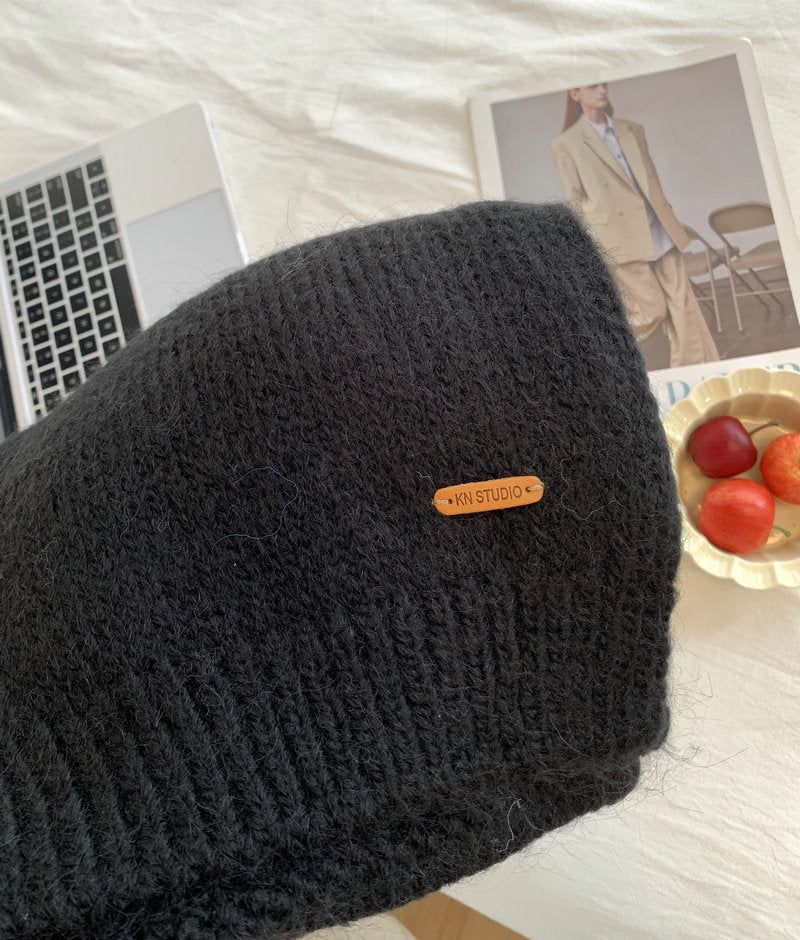 Weicher Schal mit Alpakawollanteil und Leder-Label