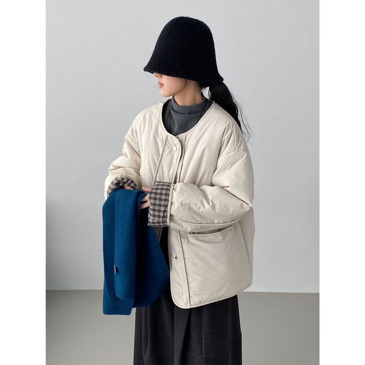 Lockere Damen-Steppjacke im Karomuster