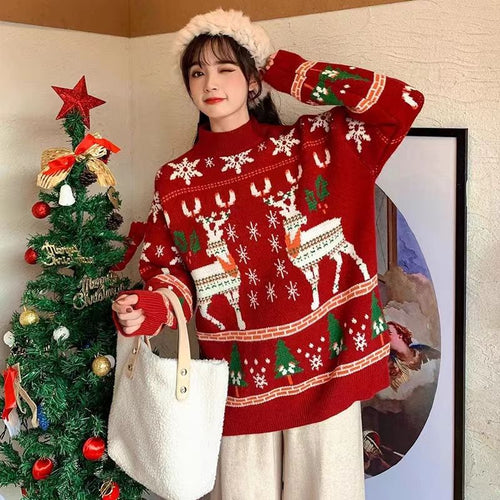 Weihnachtlicher Strickpullover mit Stickerei