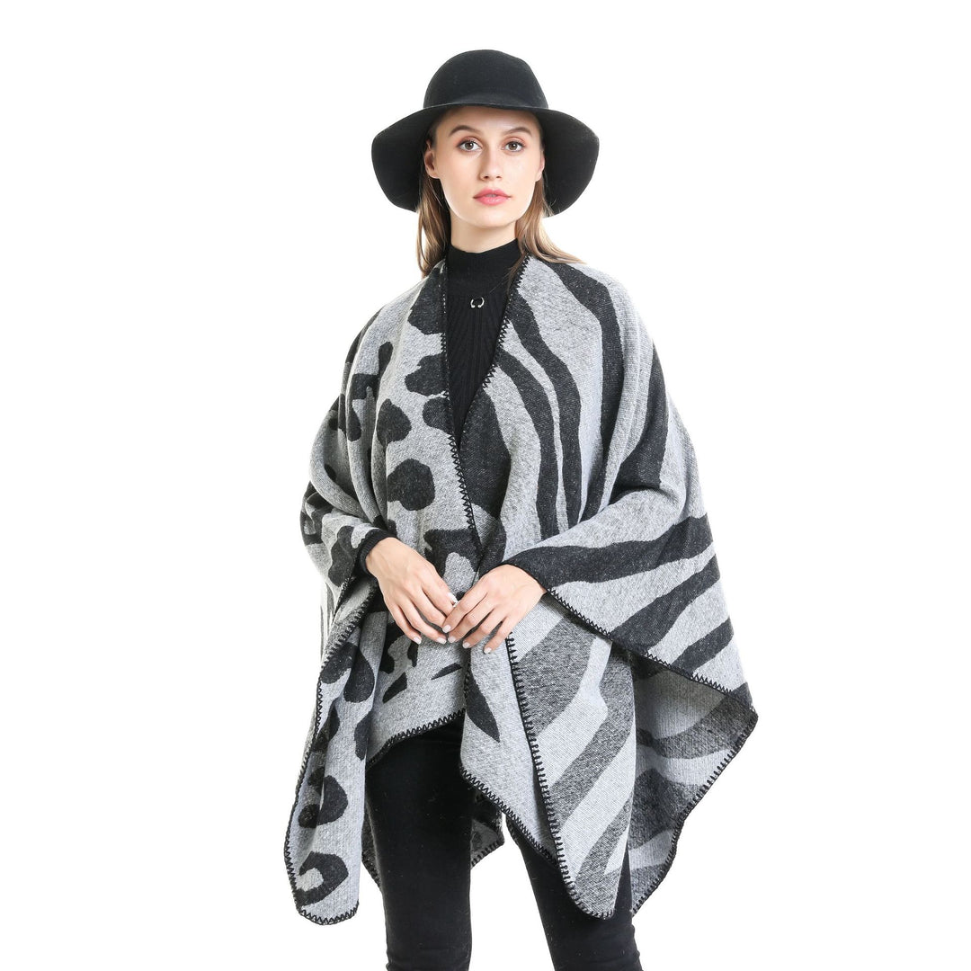 Damen Oversize‑Poncho im Revers‑Stil mit Animal‑Jacquard aus Wollmix Echo Archiv