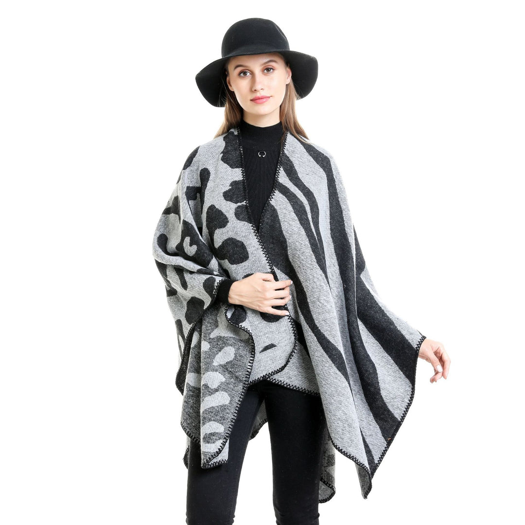 Damen Oversize‑Poncho im Revers‑Stil mit Animal‑Jacquard aus Wollmix Echo Archiv