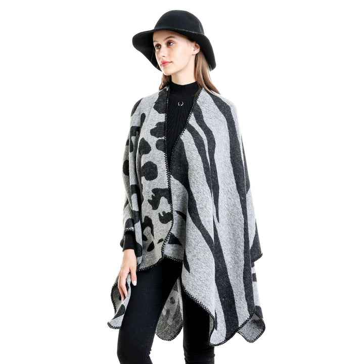 Damen Oversize‑Poncho im Revers‑Stil mit Animal‑Jacquard aus Wollmix Echo Archiv