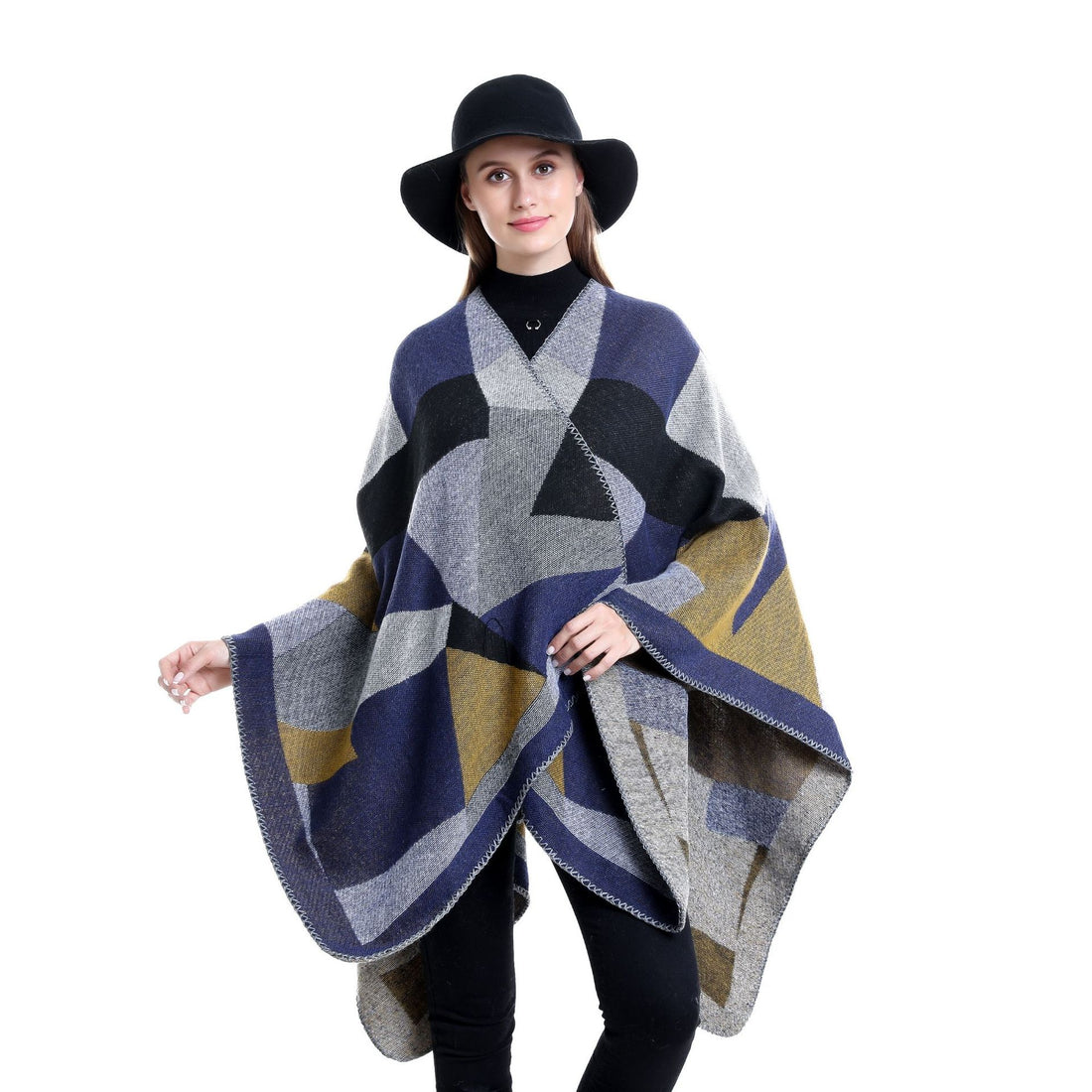 Damen Grobgestrickte Oversize-Ruana mit grafischem Blockmuster und asymmetrischem Zipfelrand – Veloura