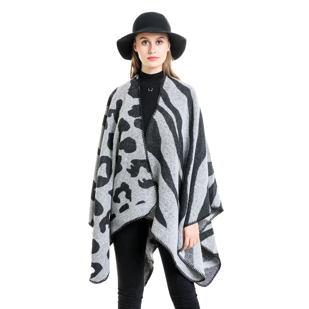 Damen Oversize‑Poncho im Revers‑Stil mit Animal‑Jacquard aus Wollmix Echo Archiv