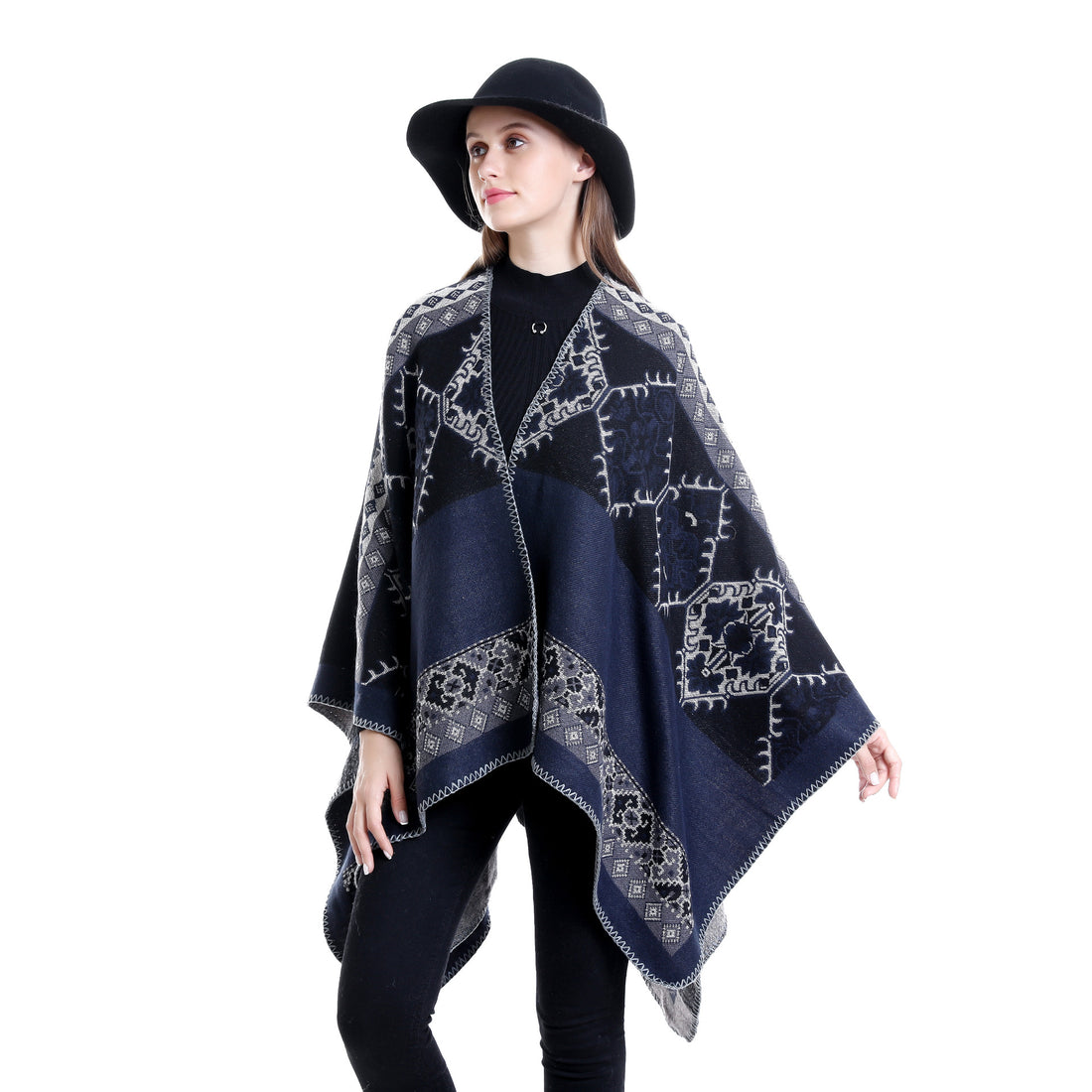 Damen Oversize-Ruana-Poncho aus Jacquardgewebe mit asymmetrischem Zipfelrand und ornamentaler Bordüre – Célinea